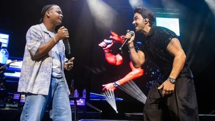 Dalvin La Melodía y Luis Fonsi en concierto.